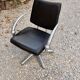 Futuristic 90s style hairdresser's chair