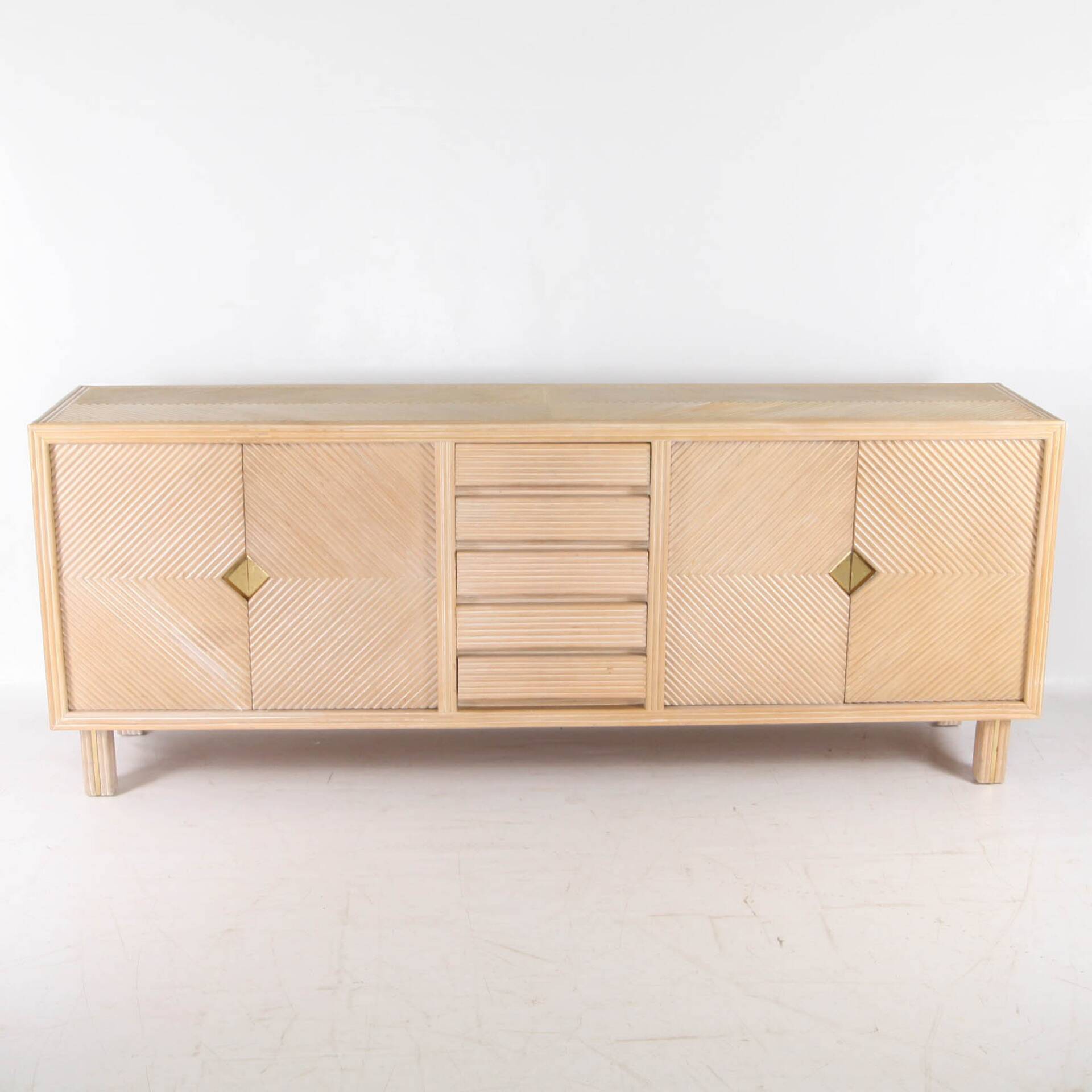 Rattan and brass sideboard