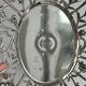 Silver-plated openwork metal stand
