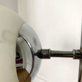 Vintage floor lamp has two opaque glass spheres