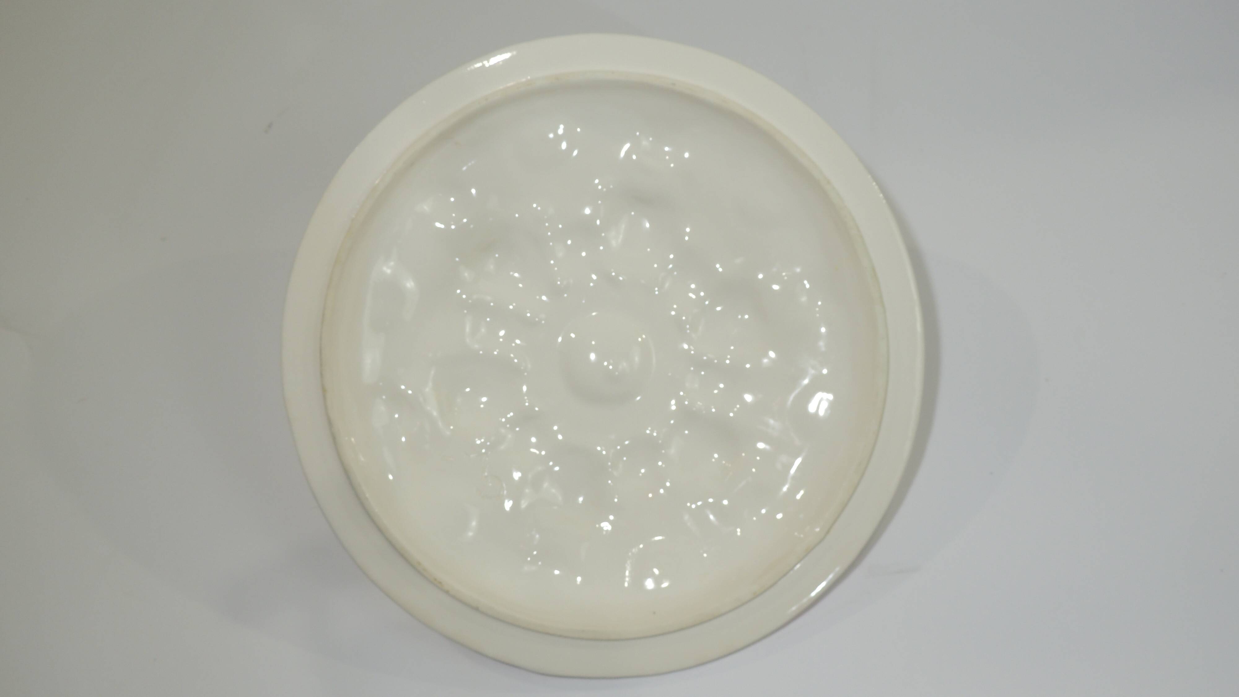 Magnificent fruit tart dish in slip signed "What's Vincent Cadeaux