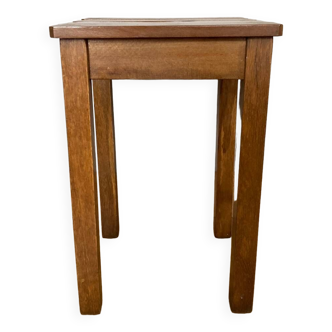 Wooden stool with central grip, quadripod base, 20th century