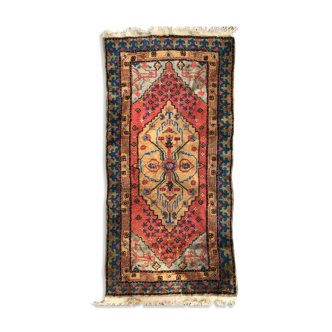 Old sinkiang oriental rug handmade 68 x 139 cm