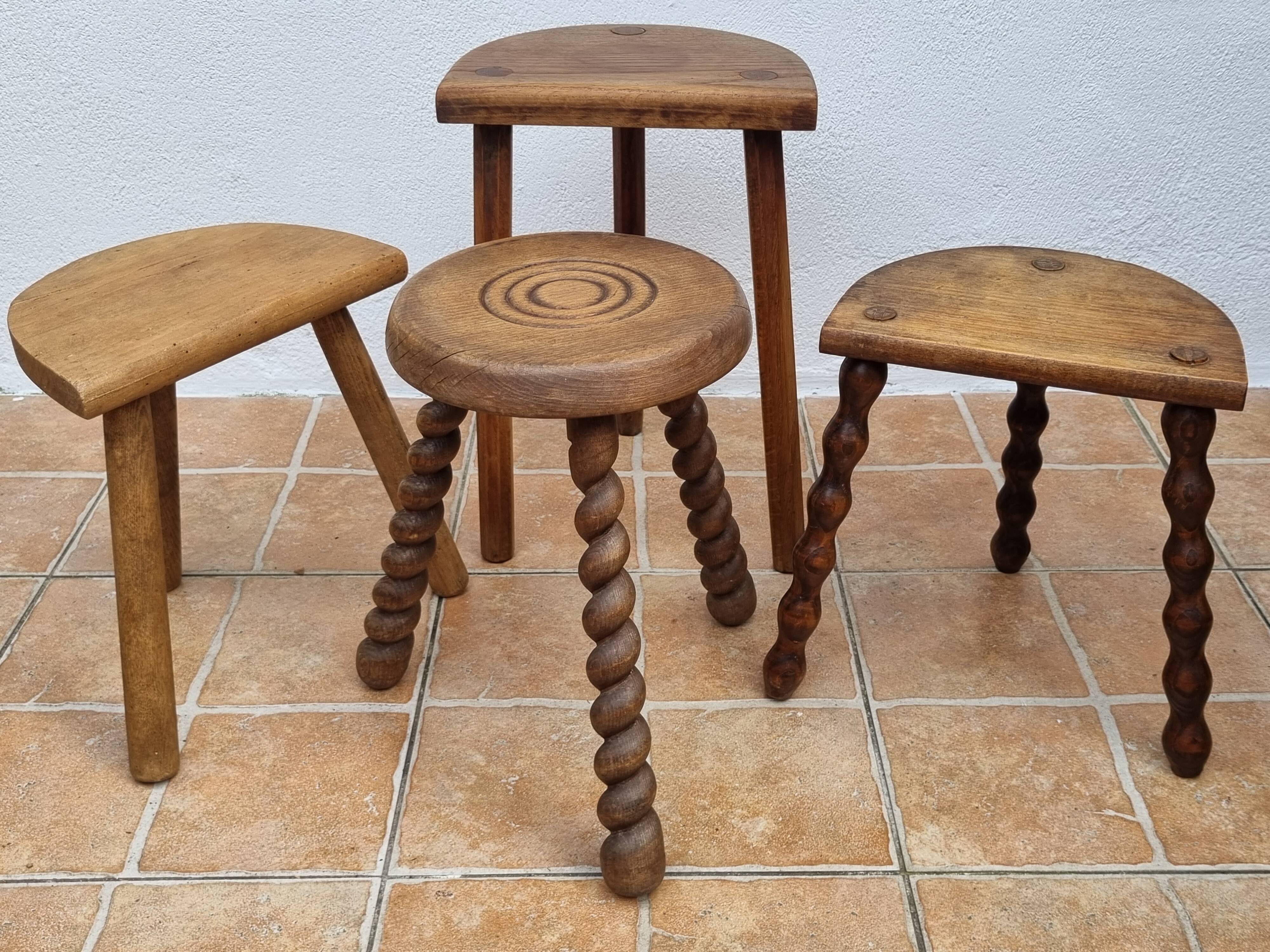 Set of four rustic solid wood plant holders, 31 to 43 cm