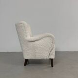 Danish lounge chair with new curly fur upholstery