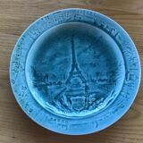 Cracked earthenware plate the Eiffel Tower