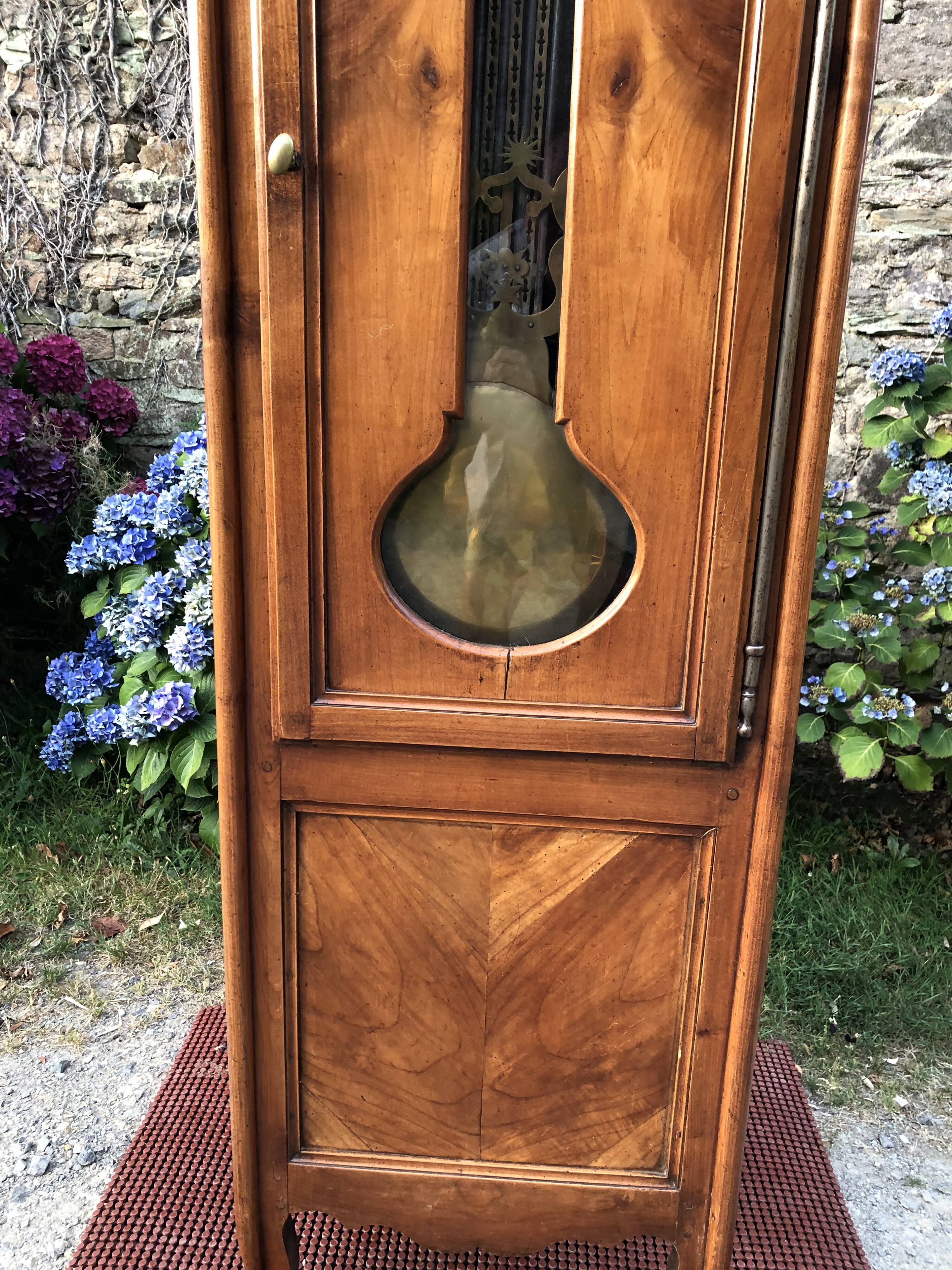 Comtoise clock in cherry style Louis XV period 19th region Fougères.