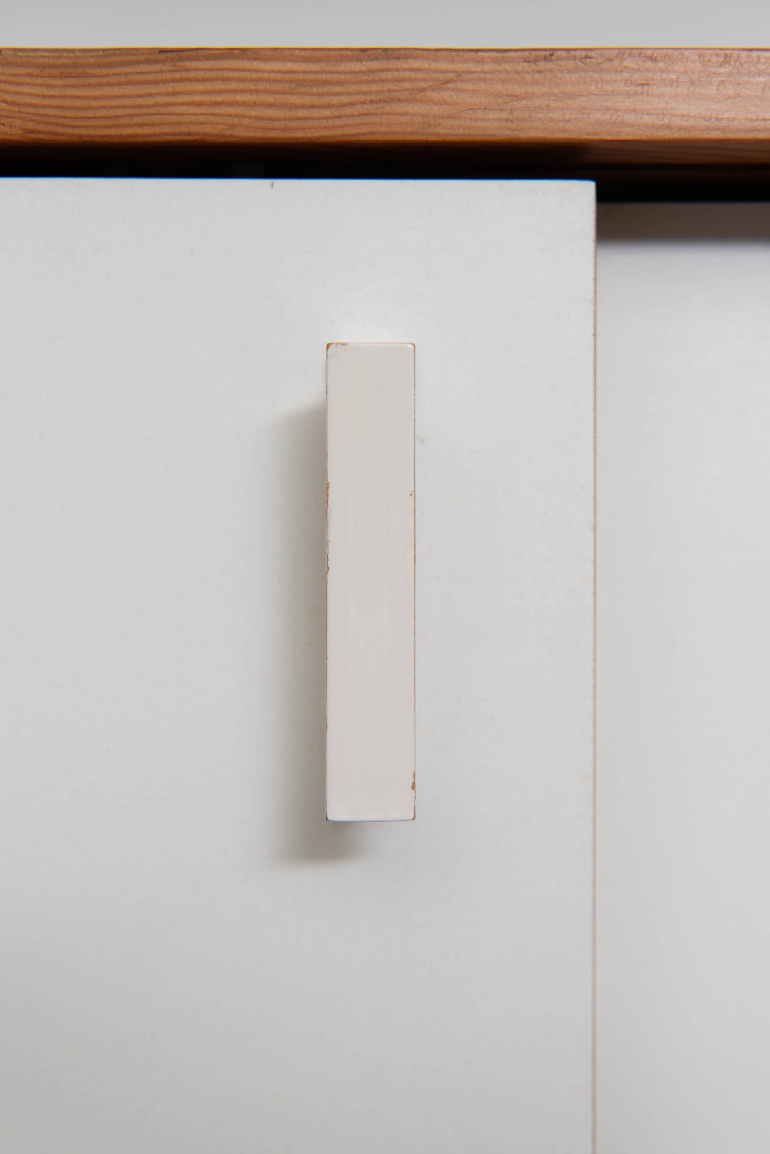 Teak wall shelf designed by Jul de Roover