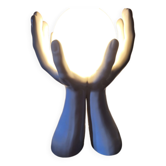 Vintage sphere lamp in the hands
