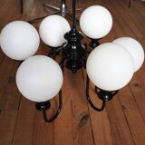 Metal chandelier and glass globes