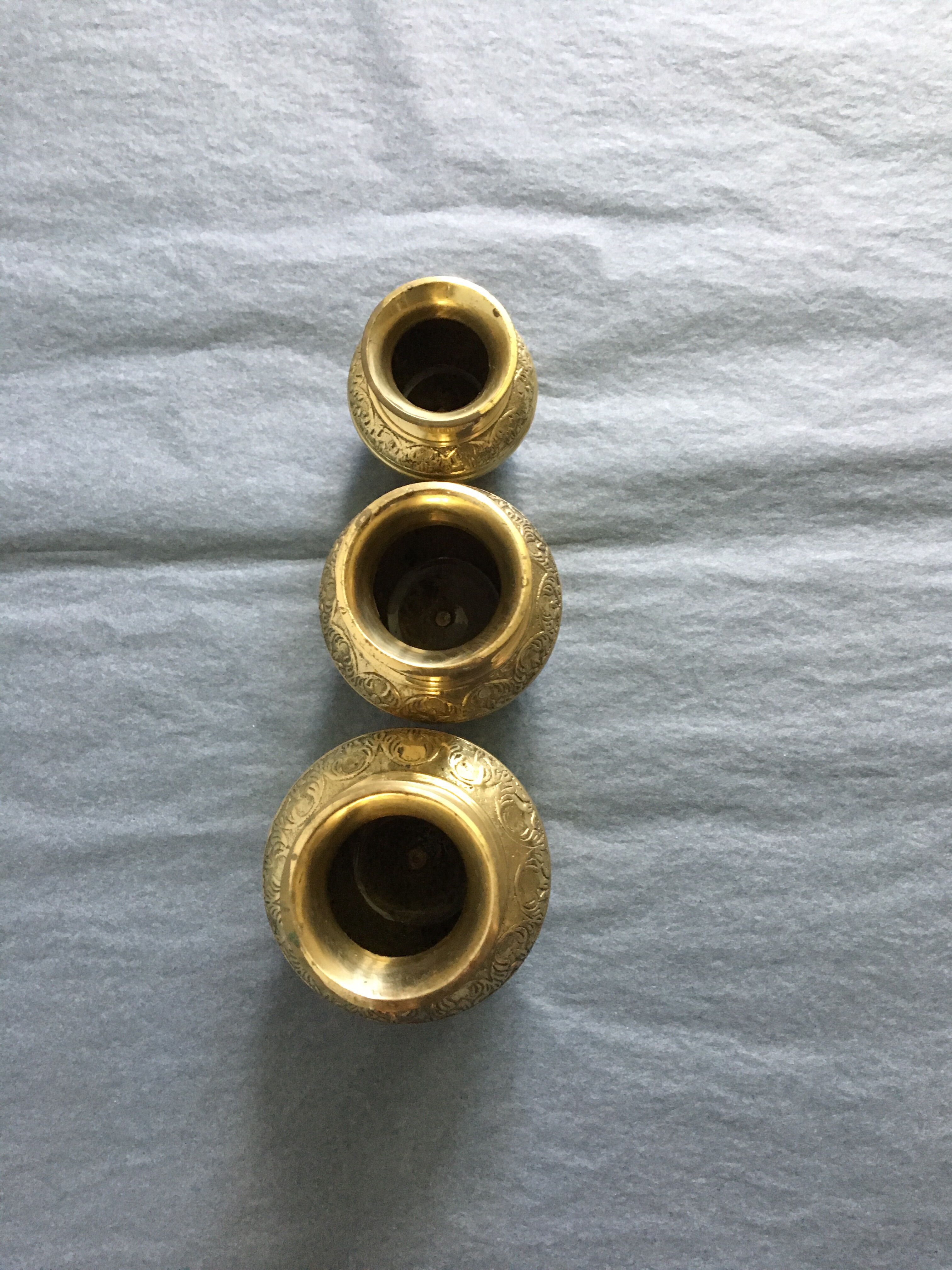 Three small brass vases