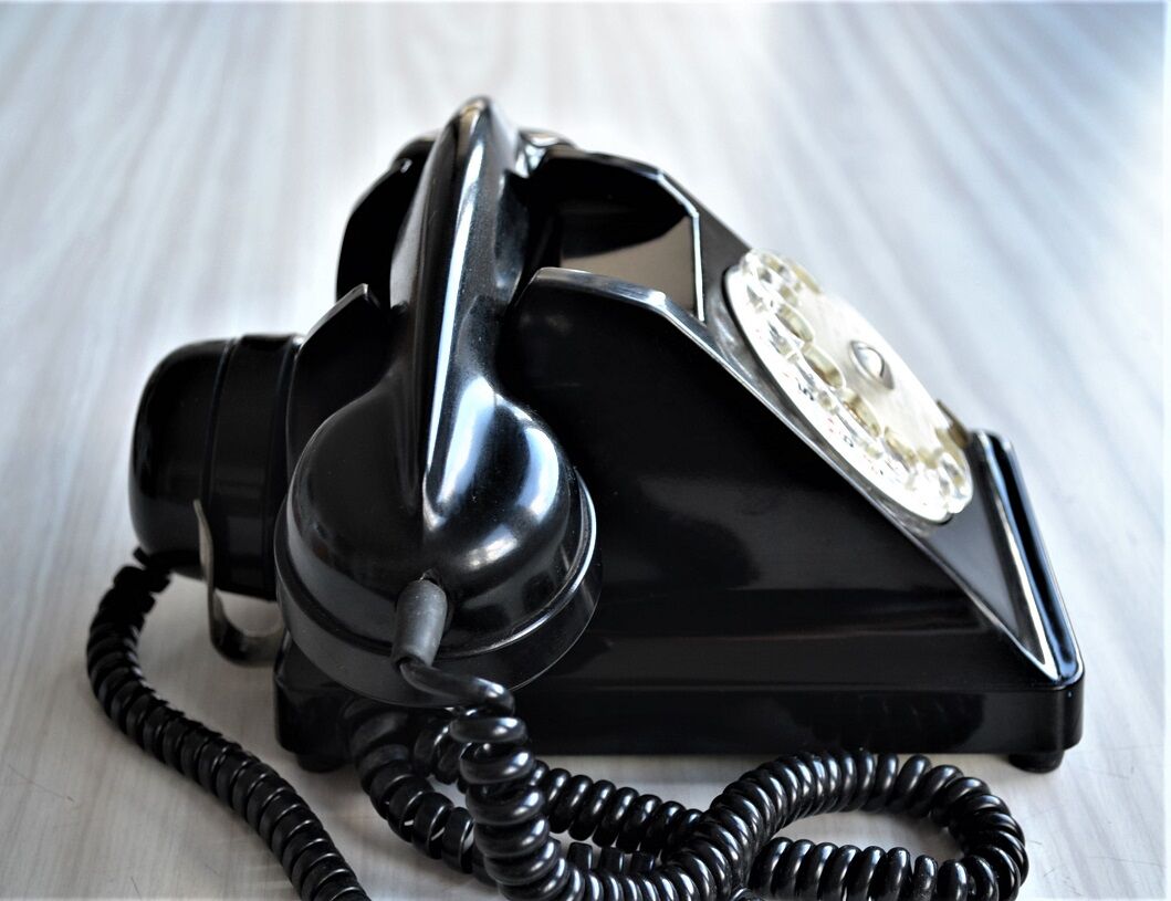 Bakelite dial PTT phone with 1960s vintage earpiece
