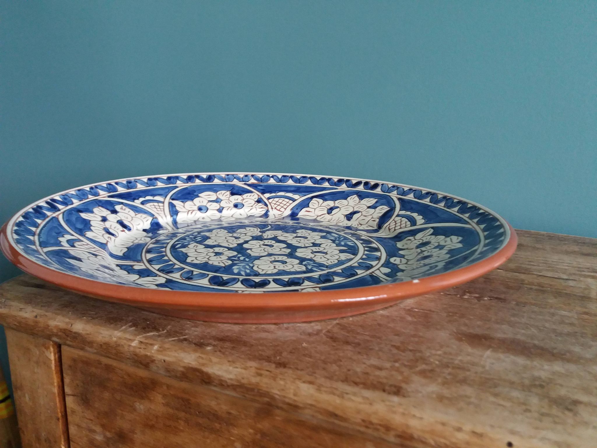 Plate signed Luis Janeiro, Portugal, enamelled terracotta plate