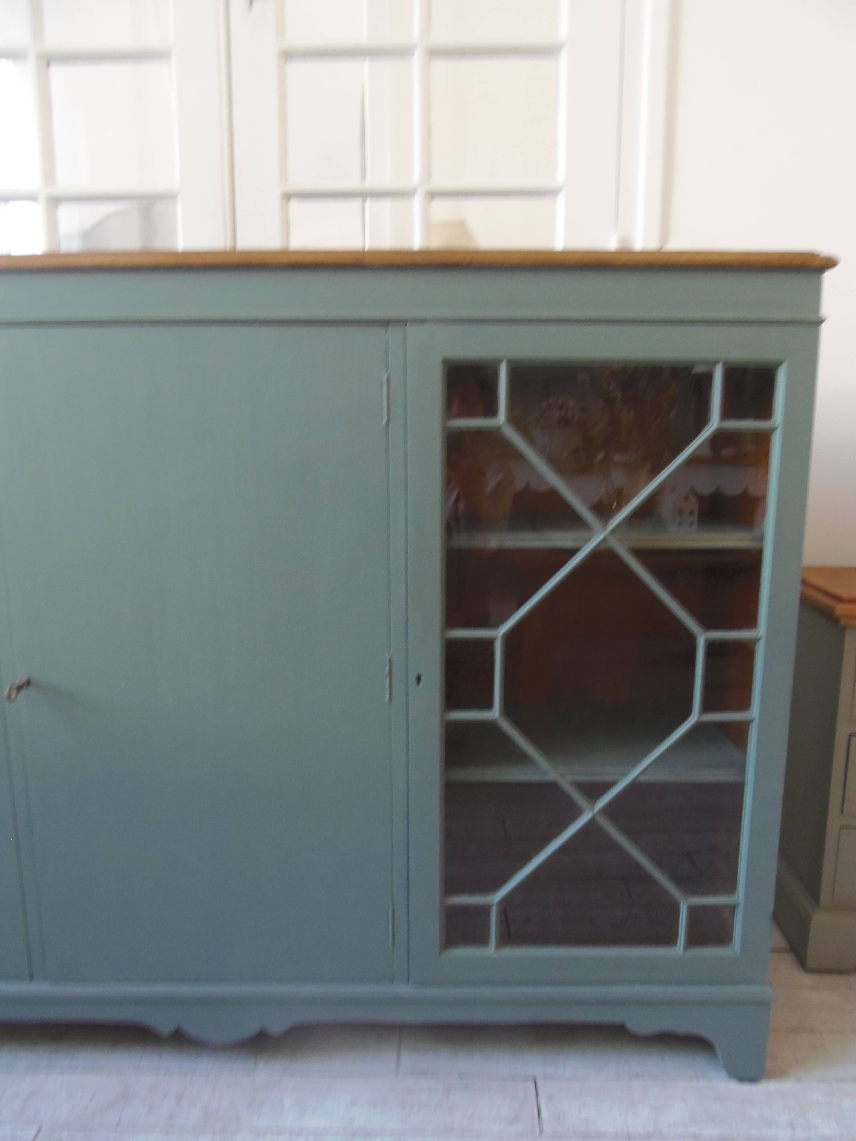 English sideboard, shallow, smoky green, wooden top.