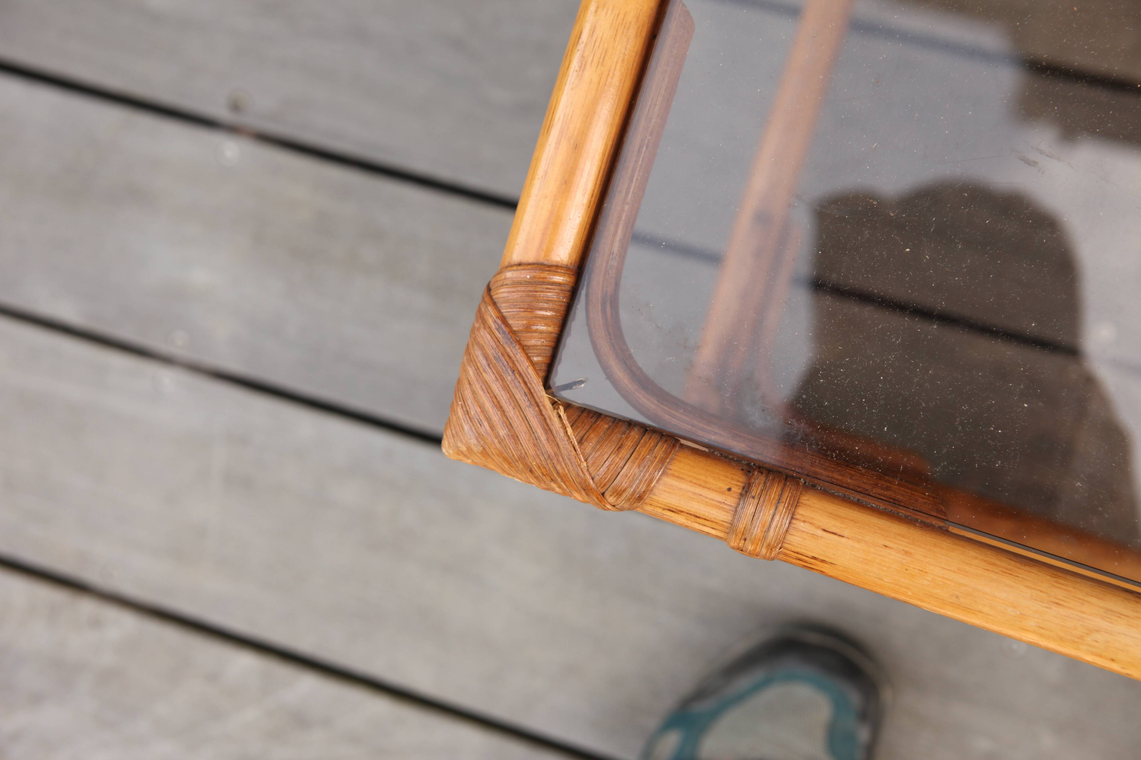 Nesting tables in rattan and glass