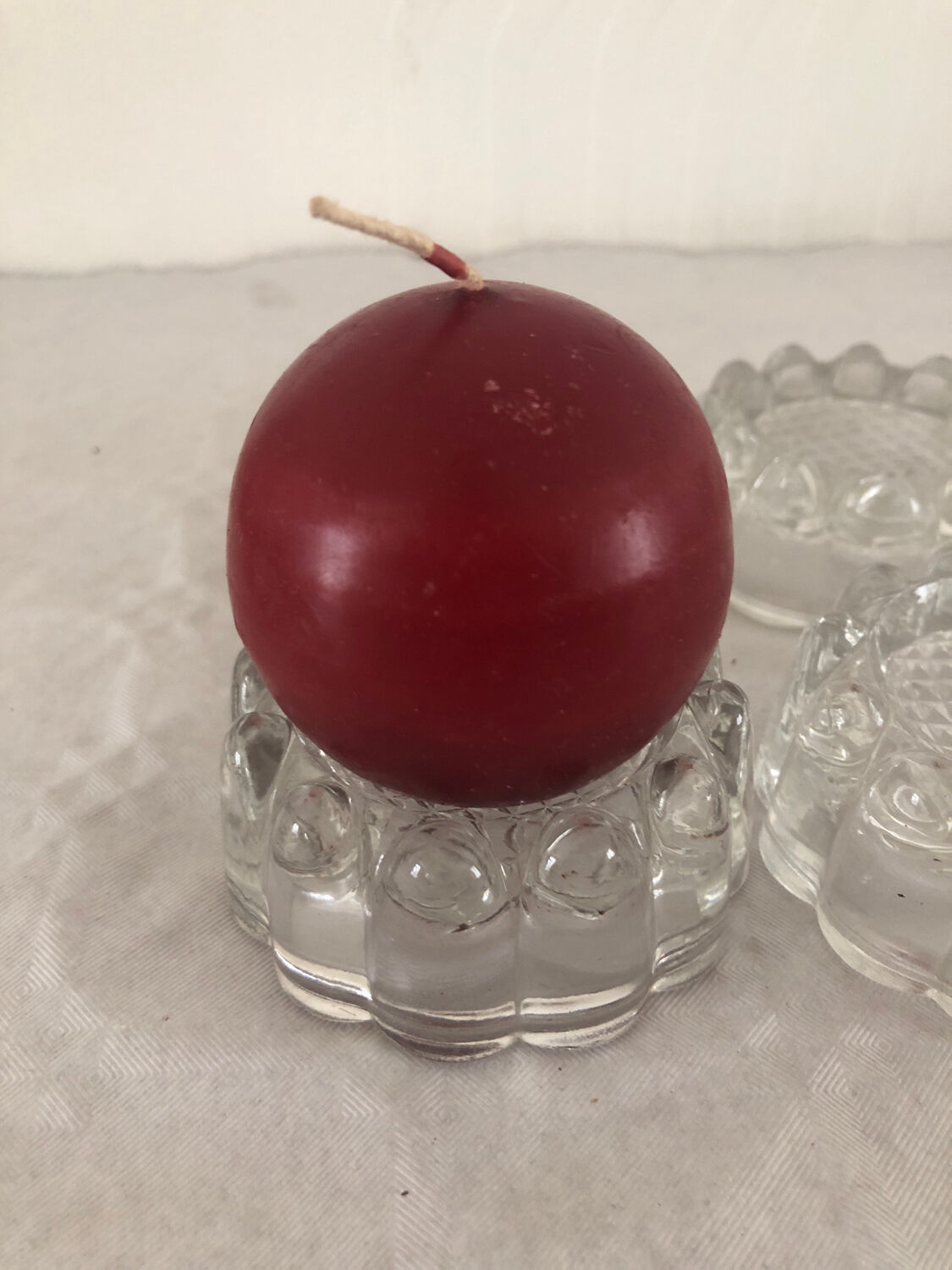 4 flat glass candle holders cut in the shape of Vintage flowers