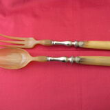 Covered with salad horn and silver metal.