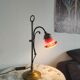 Brass articulated lamp with glass paste signed art of France.