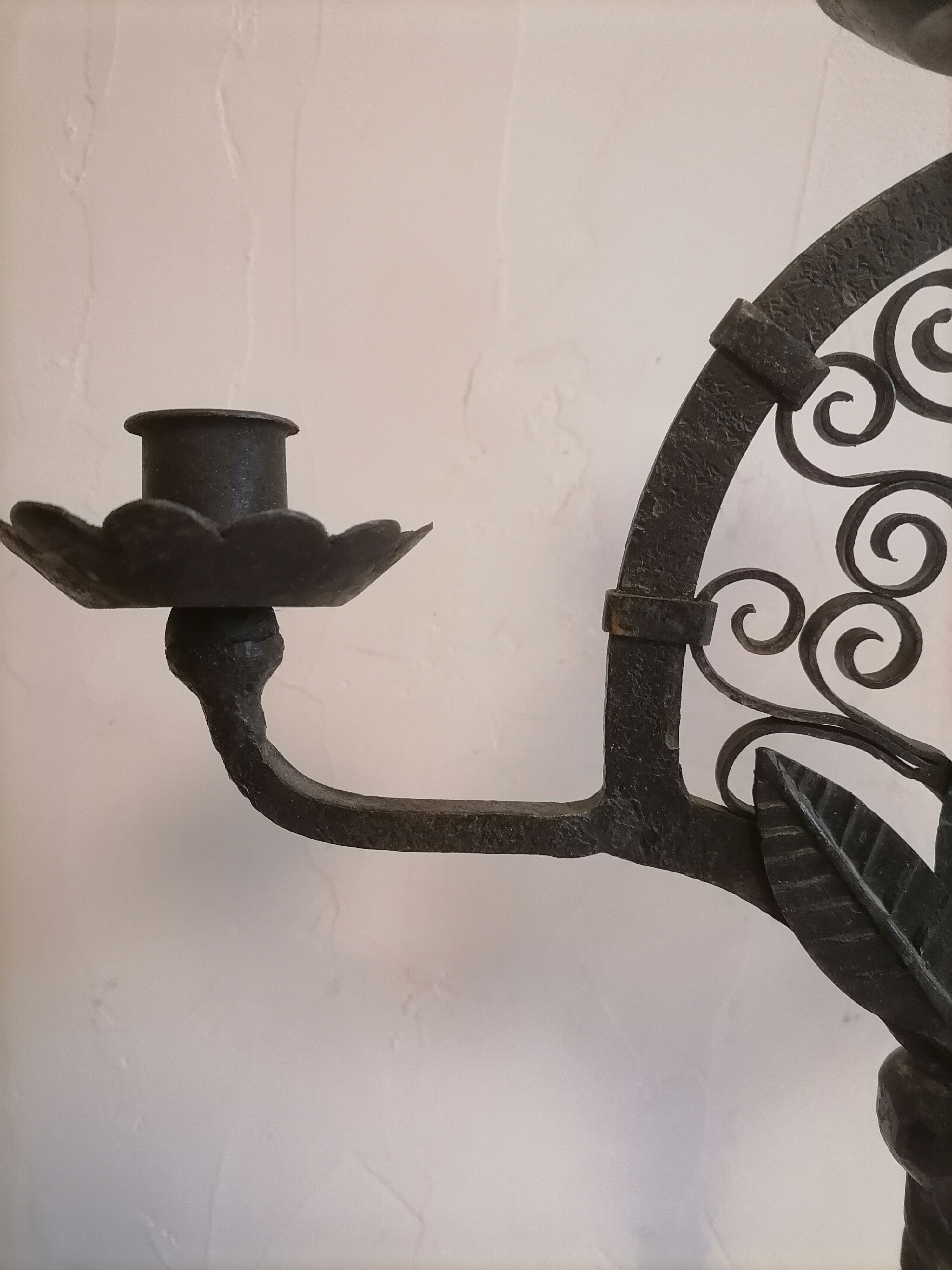 Pair of wrought iron candelabras. Mid-twentieth century.