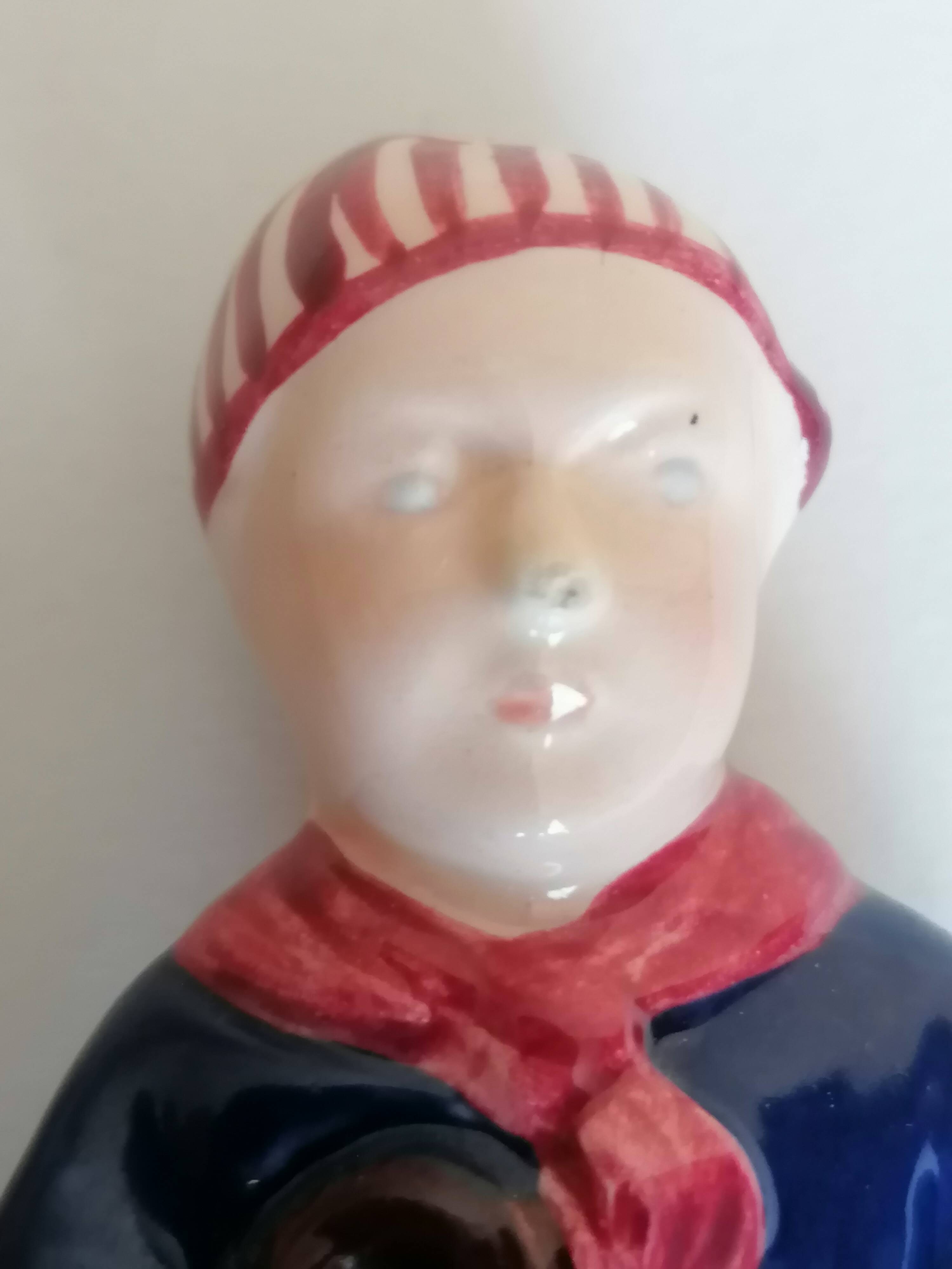 Breton salt and pepper shakers in a couple.