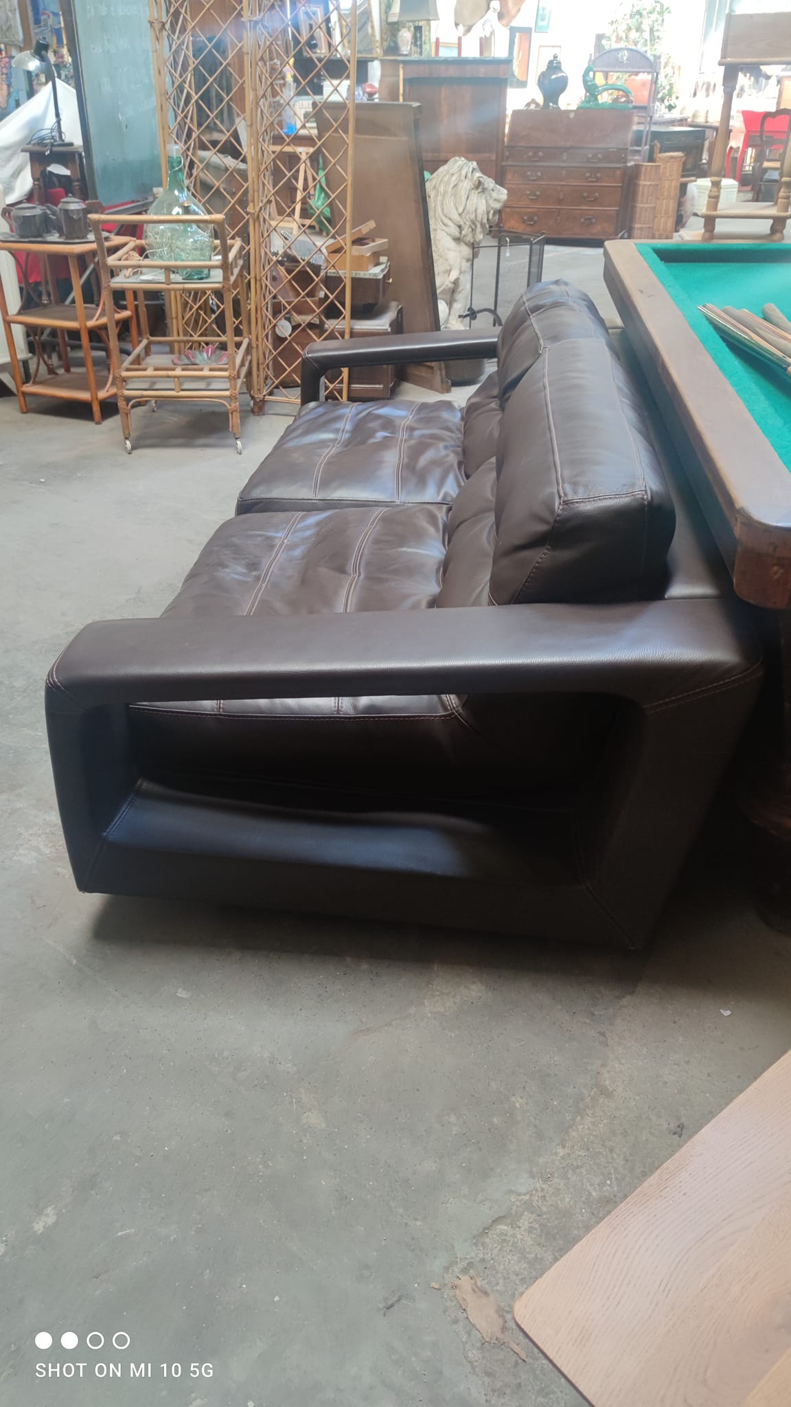 Four-seater sofa in dark brown leather from Steiner by designer Pascal Daveluy, model