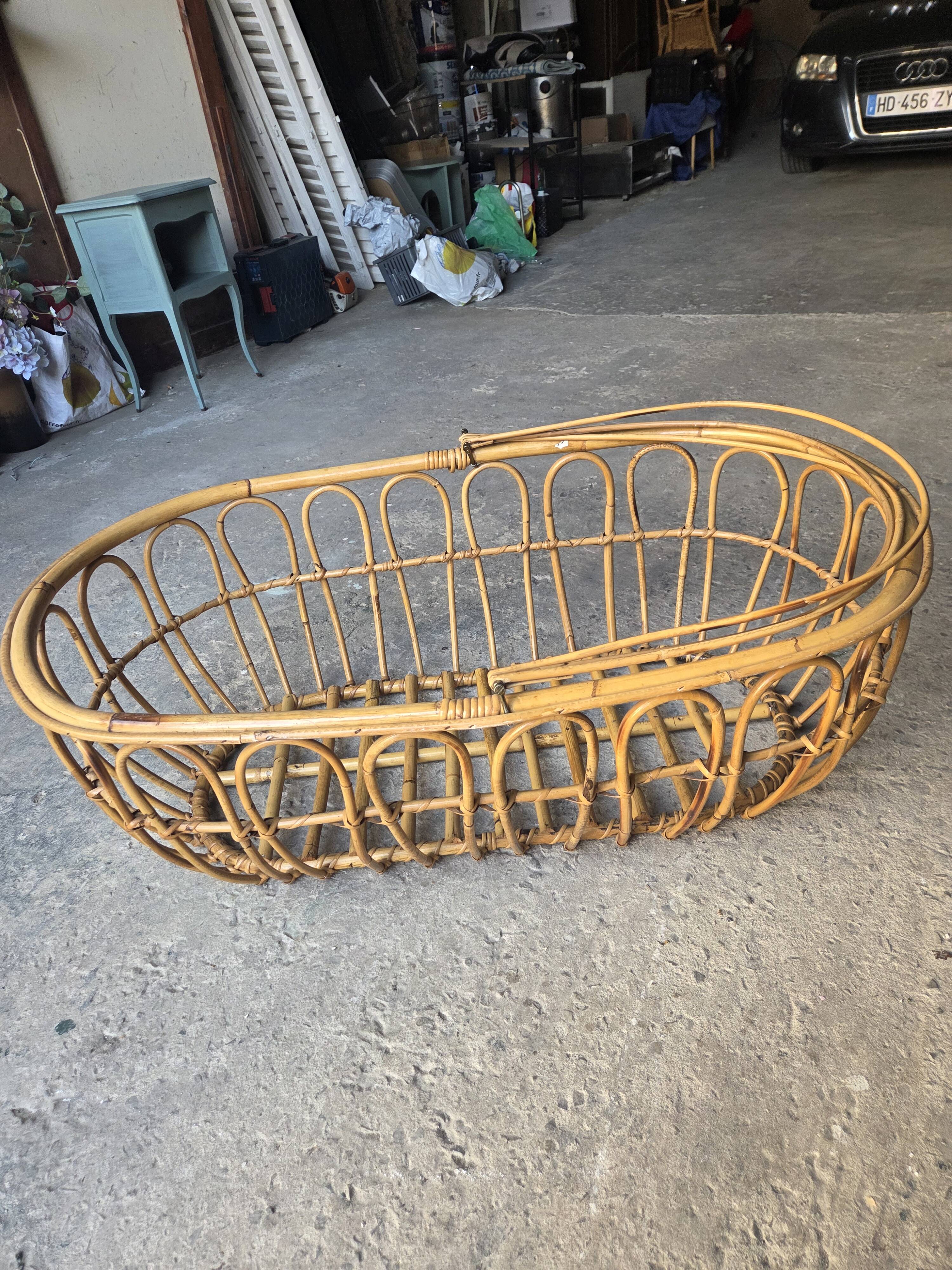 Vintage rattan cradle
