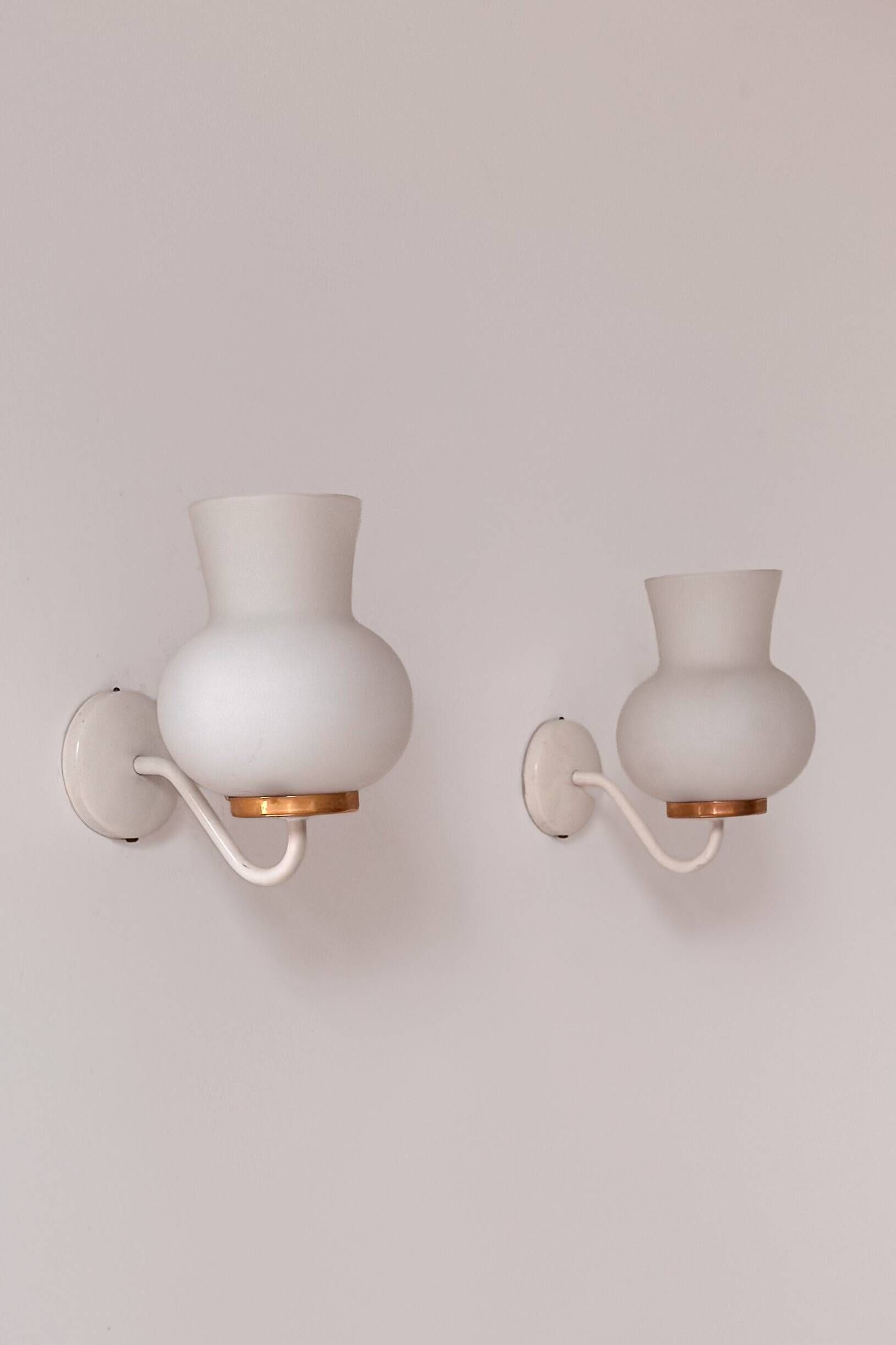 Pair of vintage wall lights in brass and opaline, France 1970.