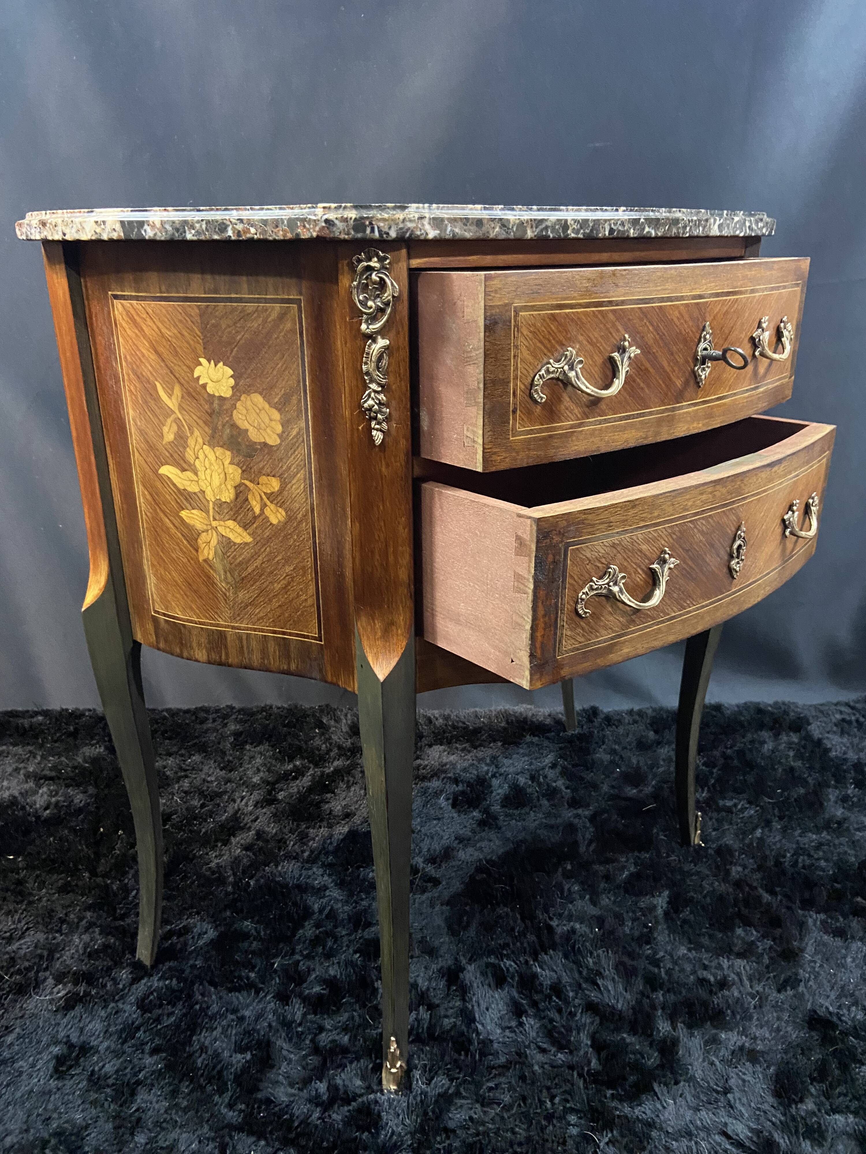 Small Louis XV style half-moon commode with marquetry and bronze decoration