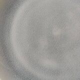 Set of 4 two-tone flat plates with a crackled effect.