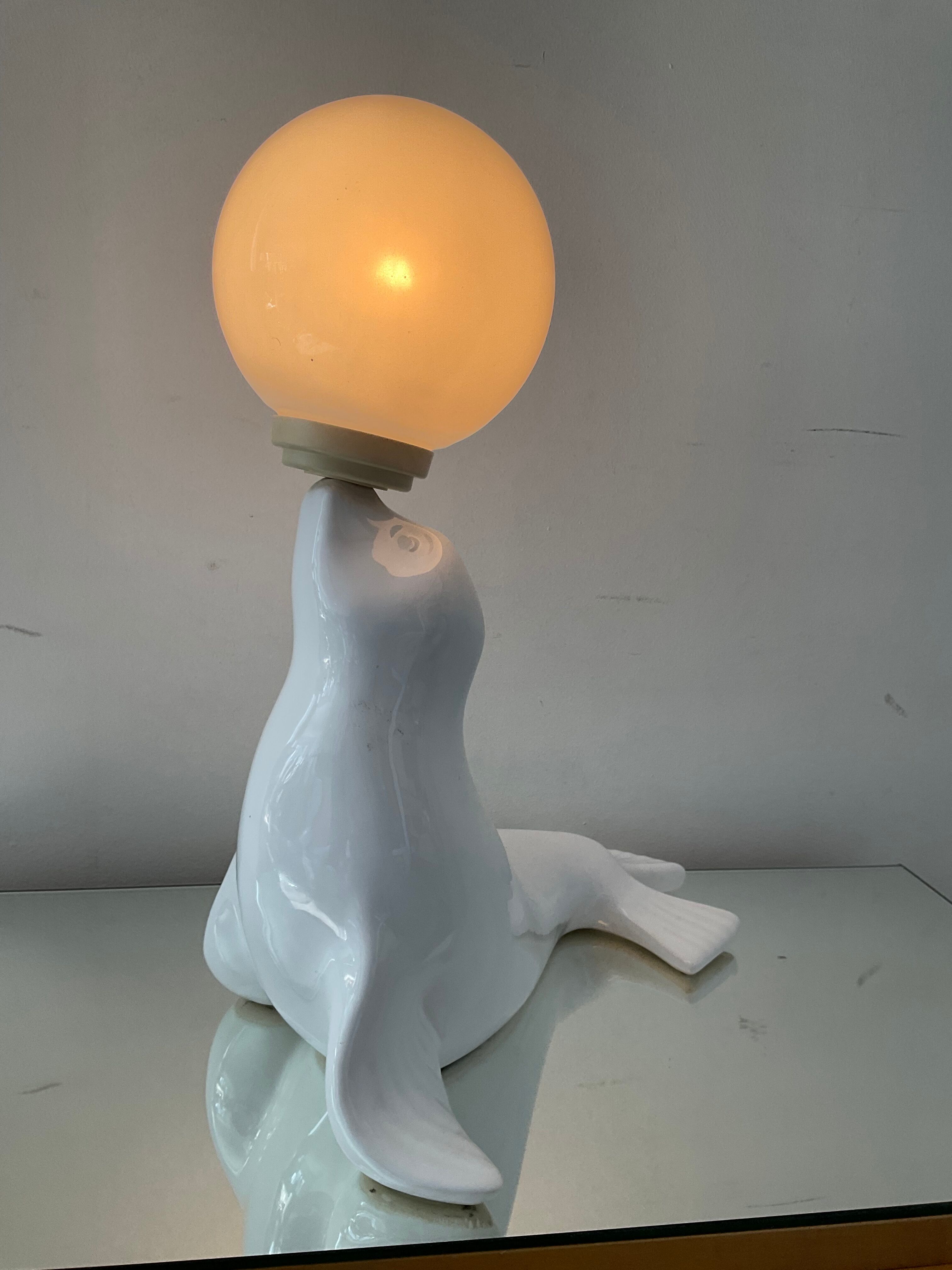 Vintage sea lion lamp in ceramic and opaline