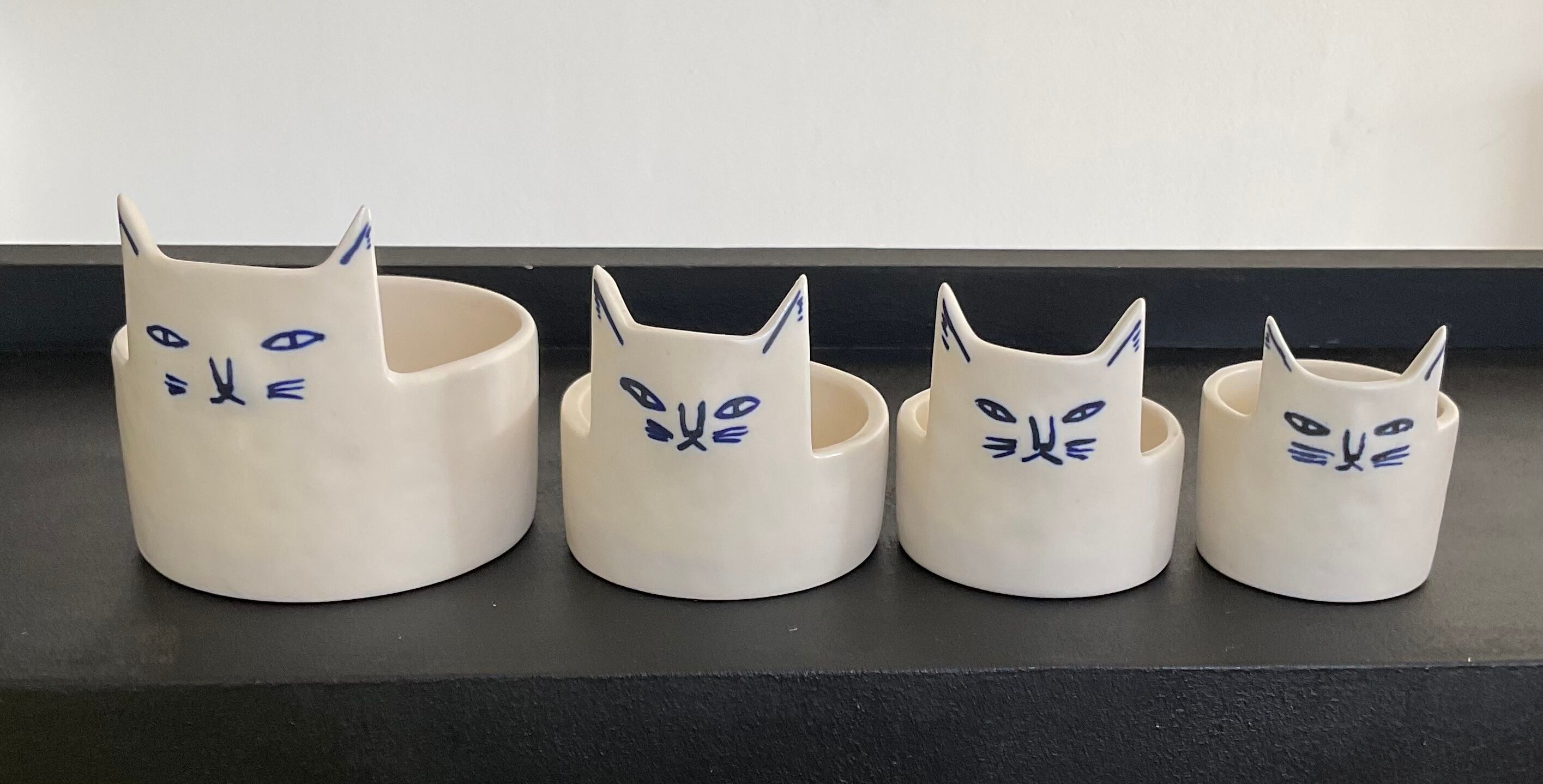Series of 4 ceramic cat ramekins