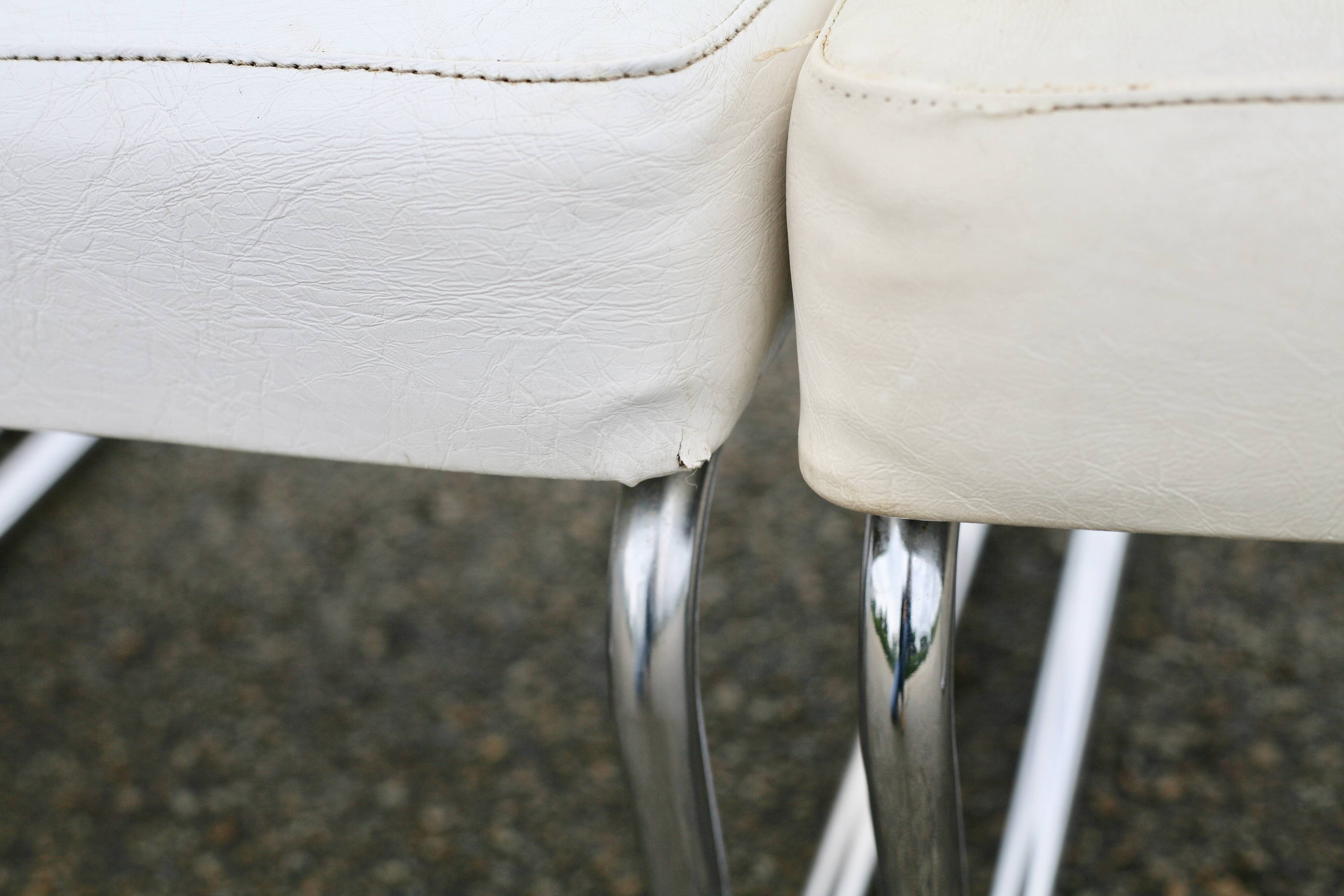4 armchairs forming a modular sofa. Steel, imitation leather, 70s