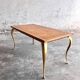 Mid-century wooden coffee table with golden metal legs and black-lined tabletop, 1950s