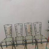 Wrought iron and marble table set with 4 chairs