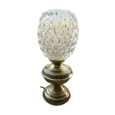 Vintage table lamp with chiseled glass globe.