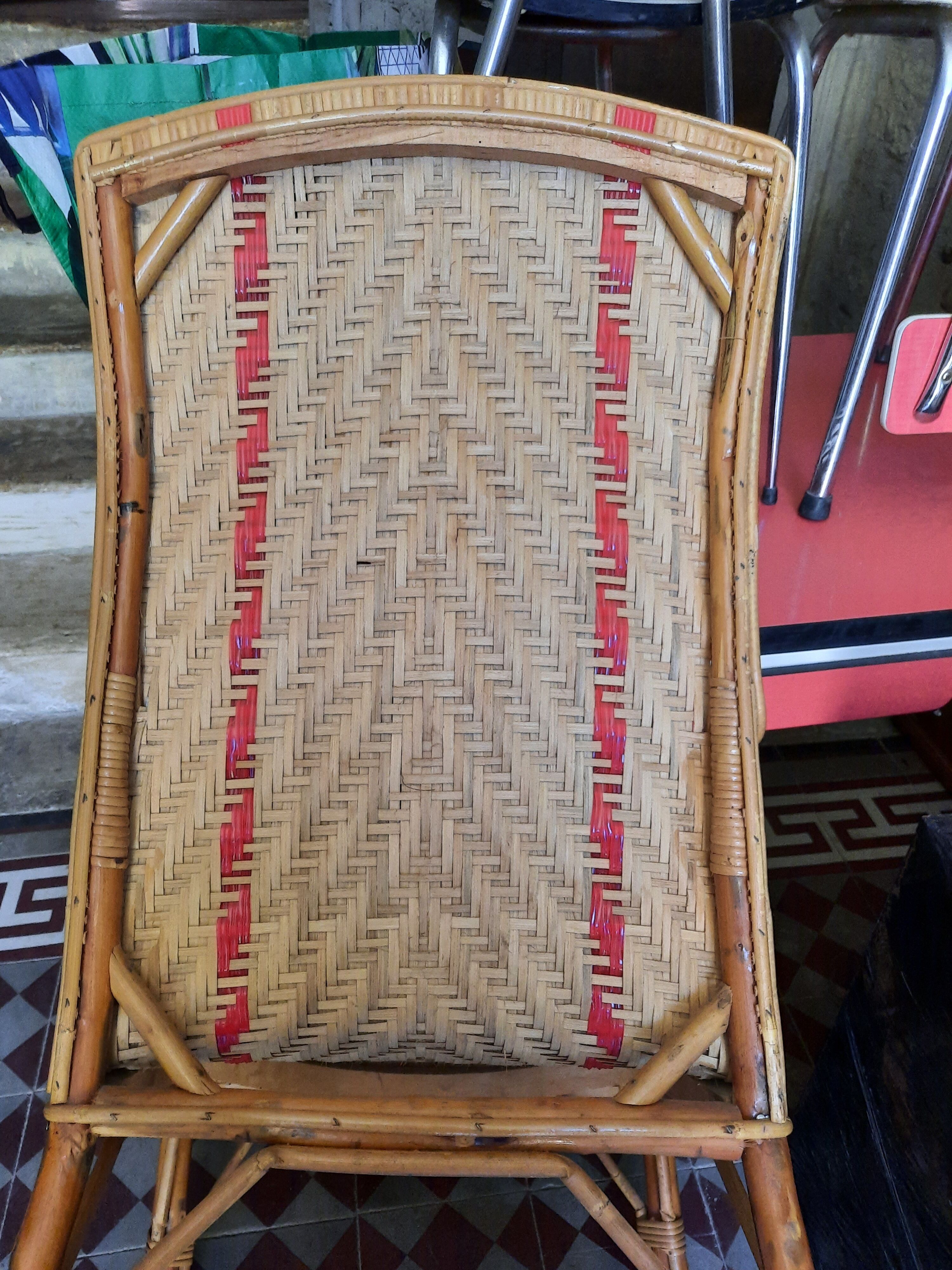 Braided rattan armchair