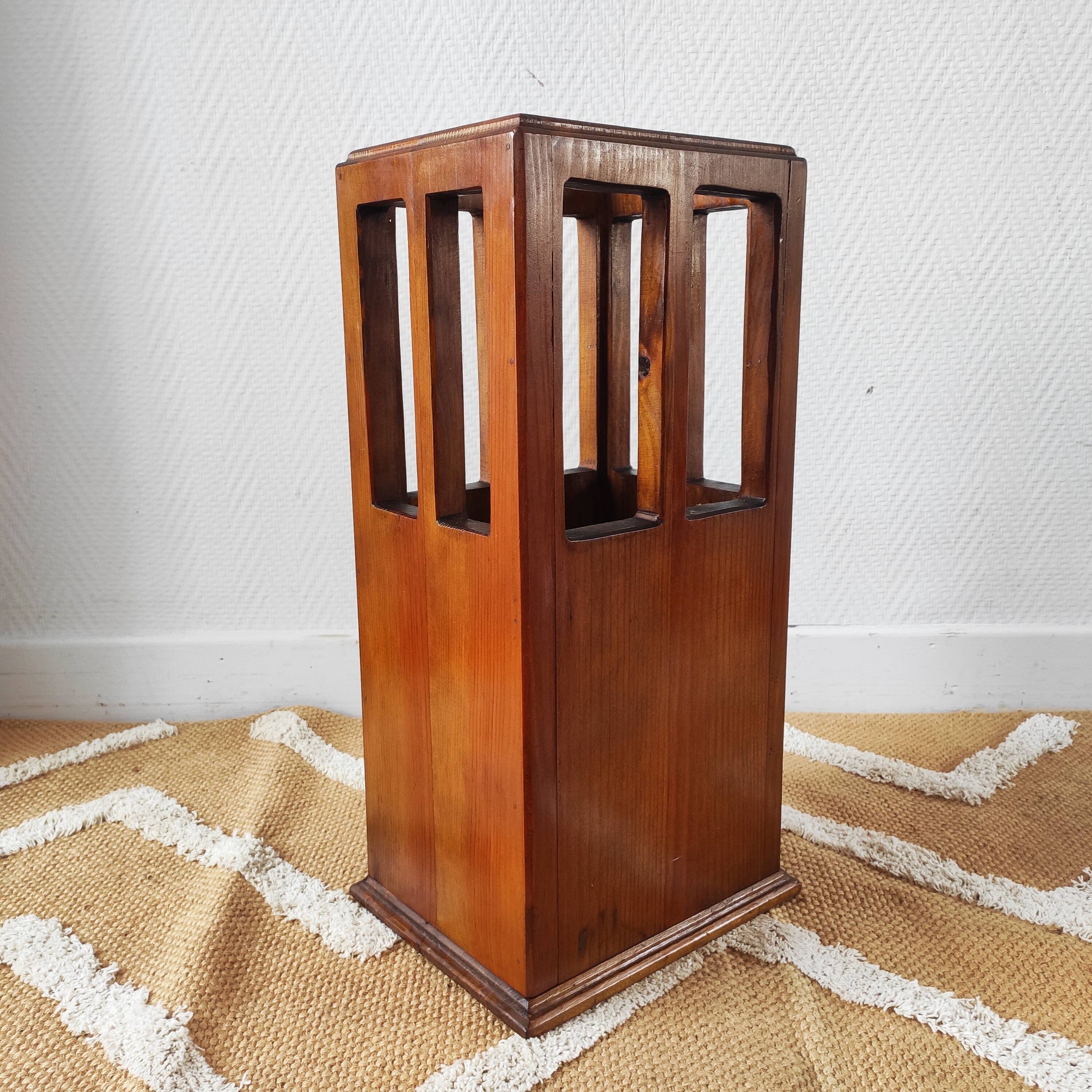 Vintage brutalist umbrella stand made of solid wood.
