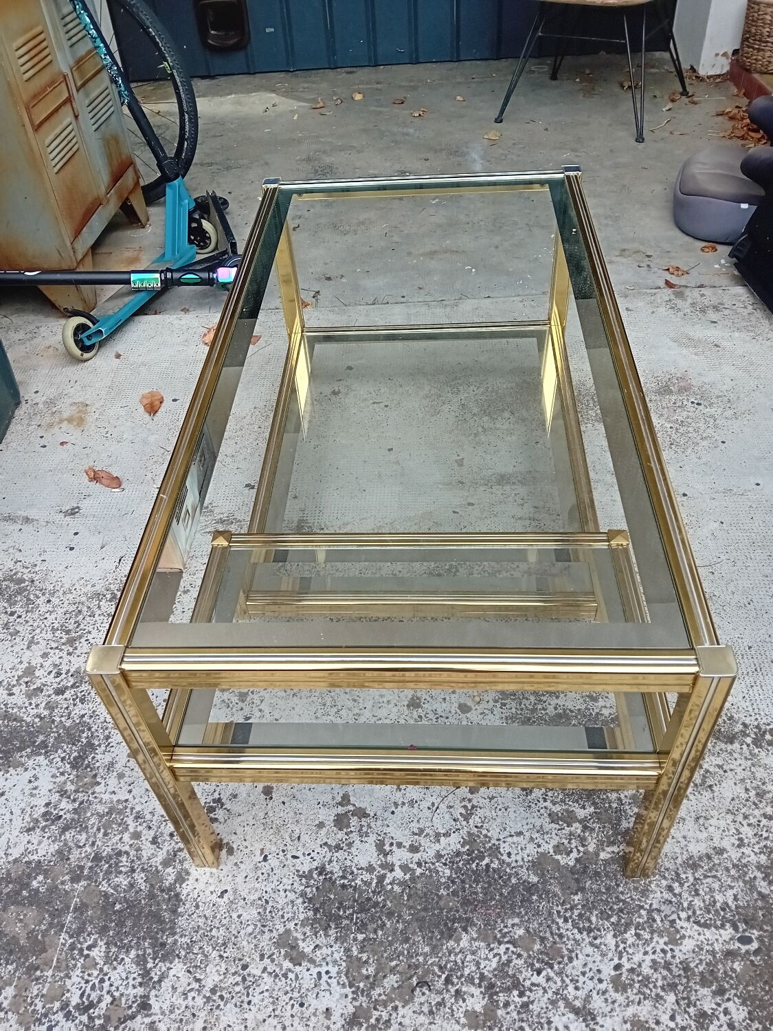 Glass and golden brass coffee table