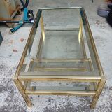 Glass and golden brass coffee table