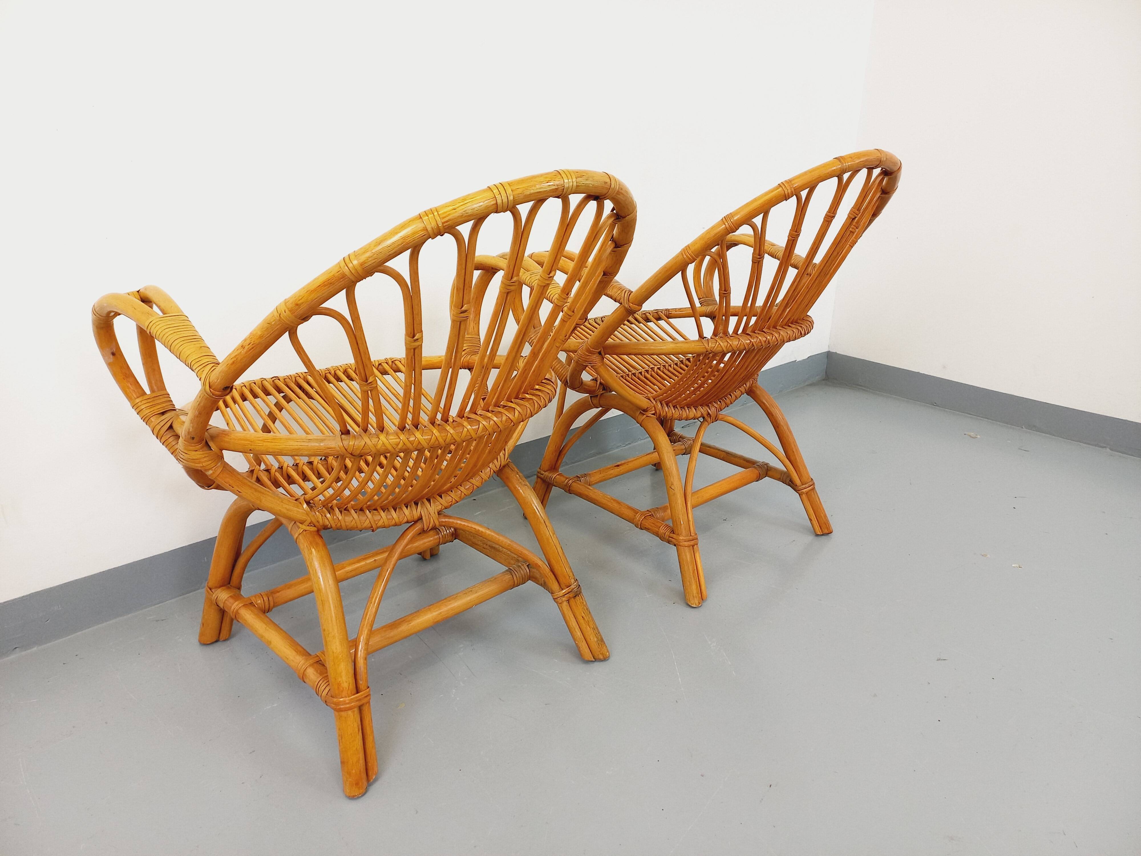 Pair of vintage rattan armchairs from the 60s