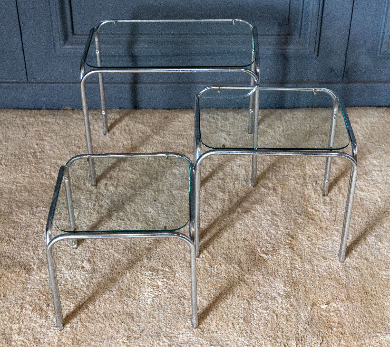 Three nesting tables 1970 Chromed metal and glass top