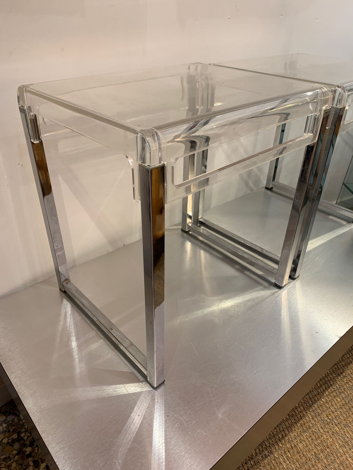 Pair of vintage chrome and acrylic glass bedside tables