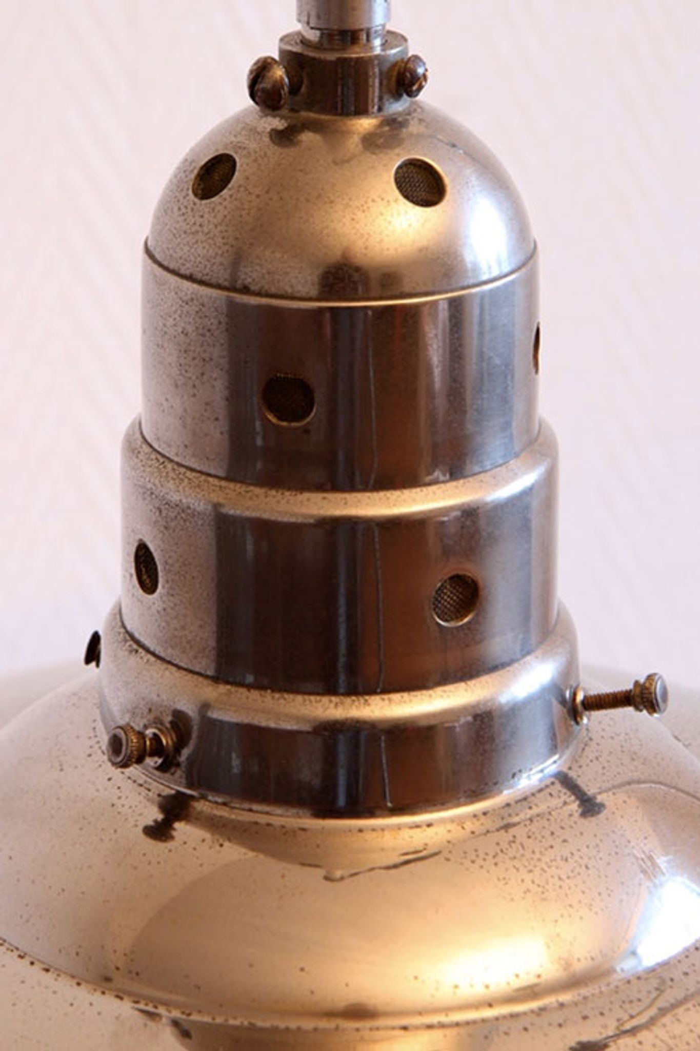 Old Bauhaus lamp in mercurized glass chrome industrial suspension.