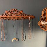 Old wall corner shelf in cut wood from the 1900s