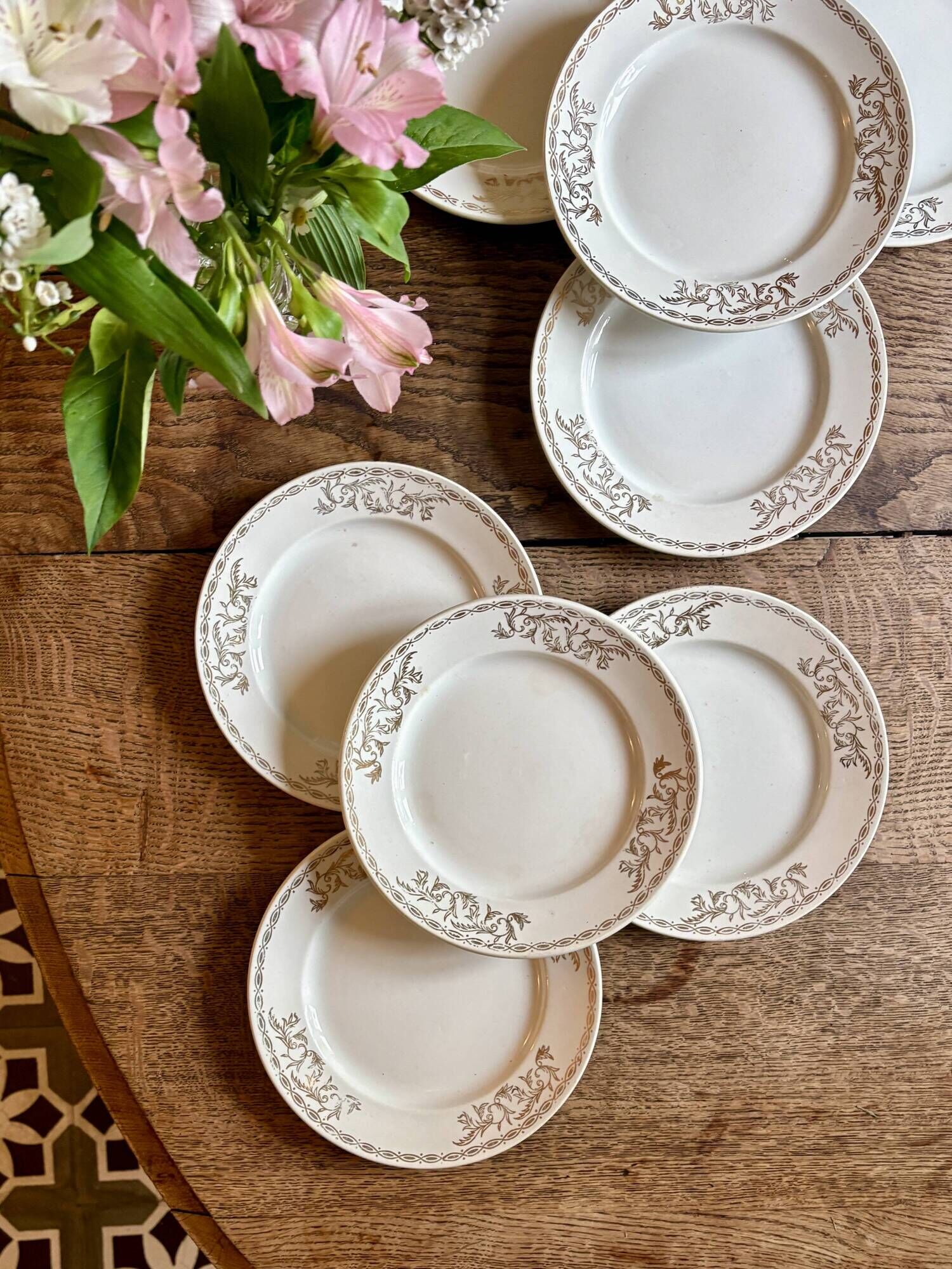 Set of 8 vintage white and gold dessert plates.