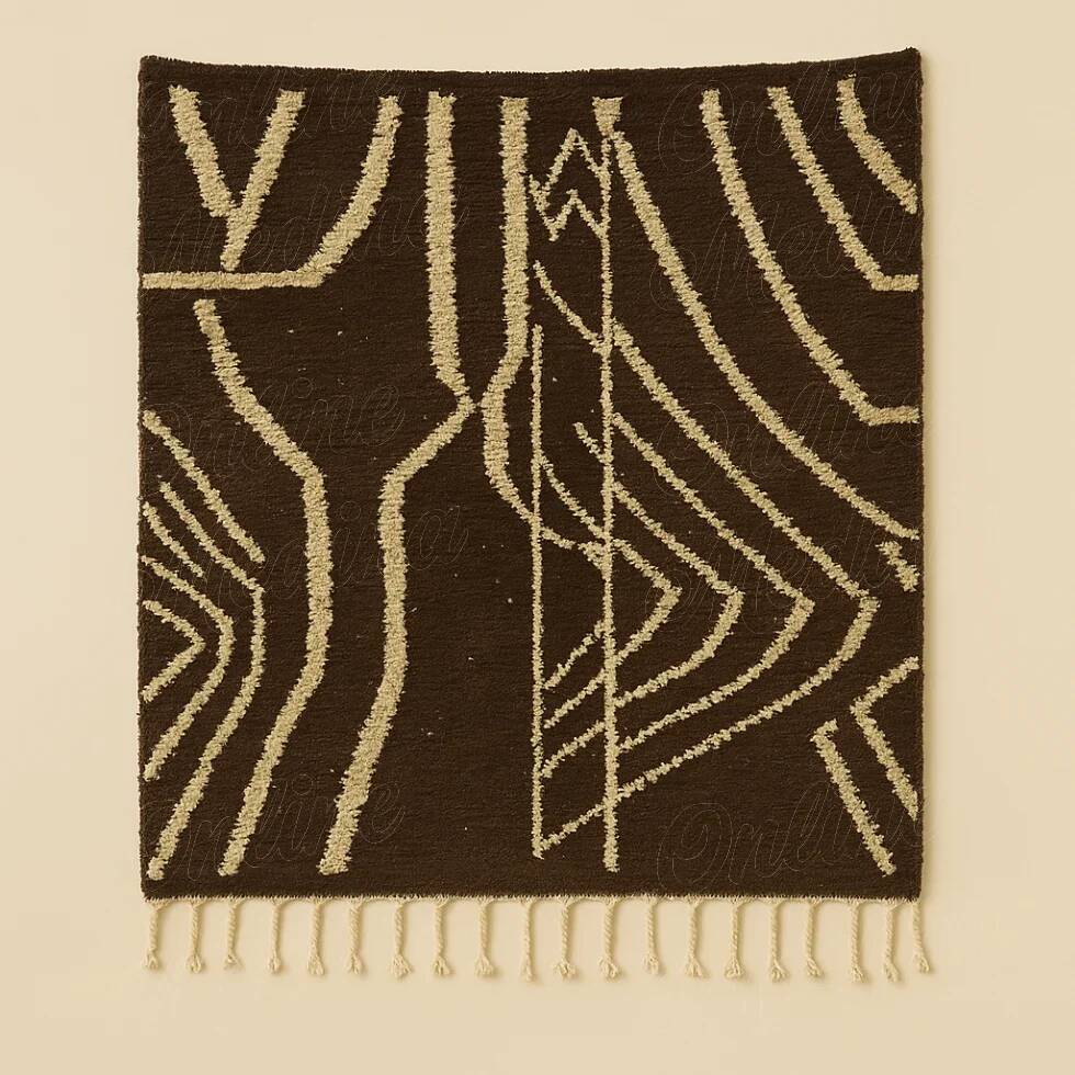 Brown Berber rug with abstract lines.