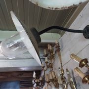 industrial wall light in the shape of a swan neck