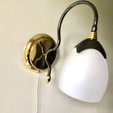 Black and gold wall light with white opaline flower, Italy 1990.