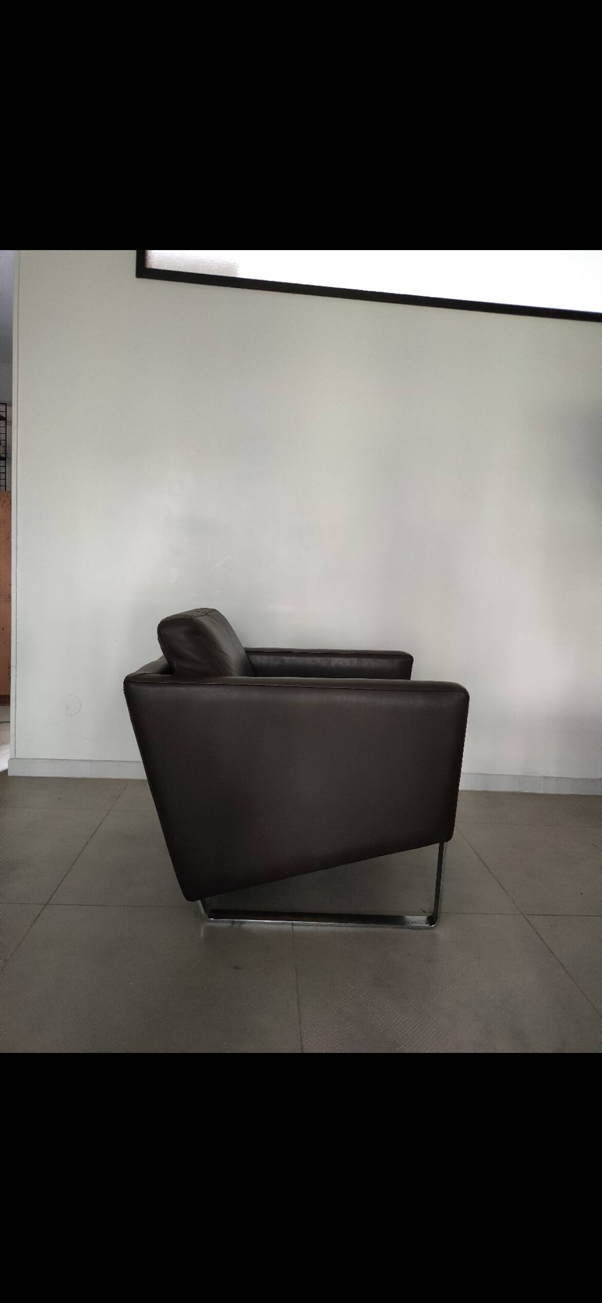 Leather armchair metal base
