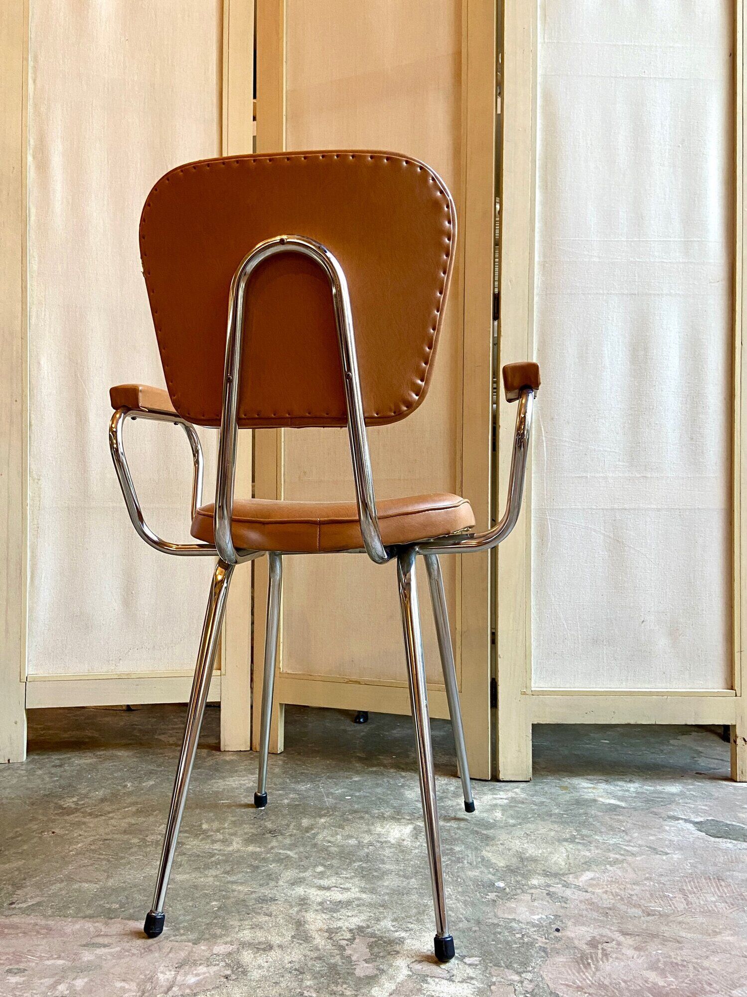 Armchair in chromed metal and tawny skaï 1950s